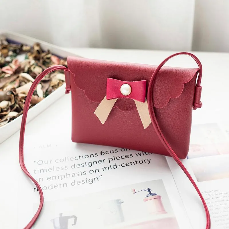 Bags 2024 Japanese and Korean new women's bags pearl bow casual small square bag hand-held shoulder crossbody mobile phone bag